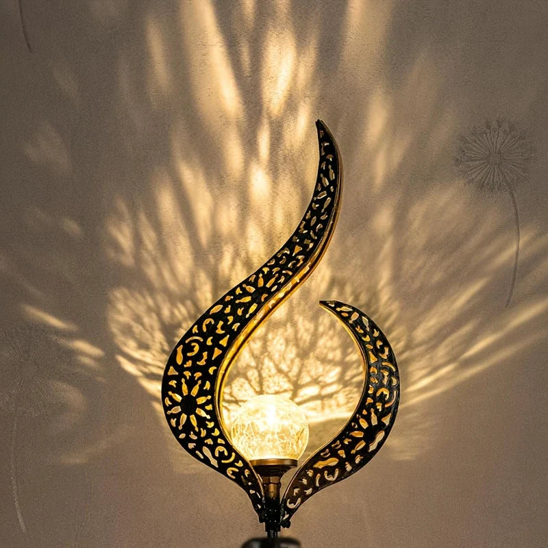 Waterproof Metal Solar Garden Light – LED Outdoor Lighting in Moon, Flame, Sun, or Star Shapes
