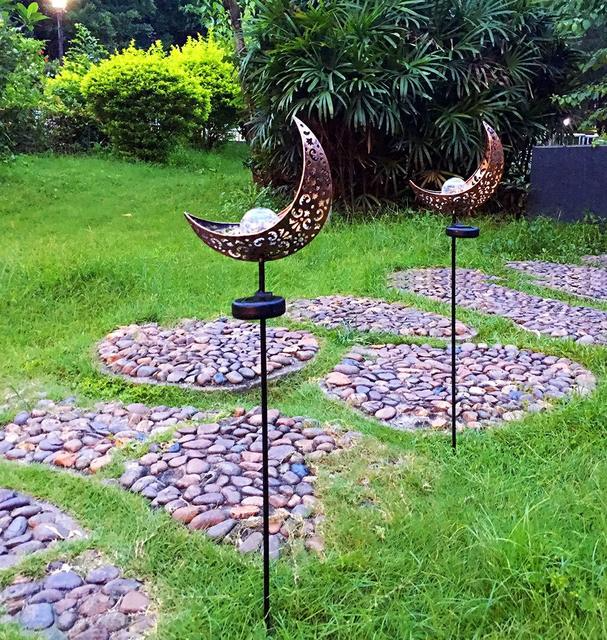 Waterproof Metal Solar Garden Light – LED Outdoor Lighting in Moon, Flame, Sun, or Star Shapes